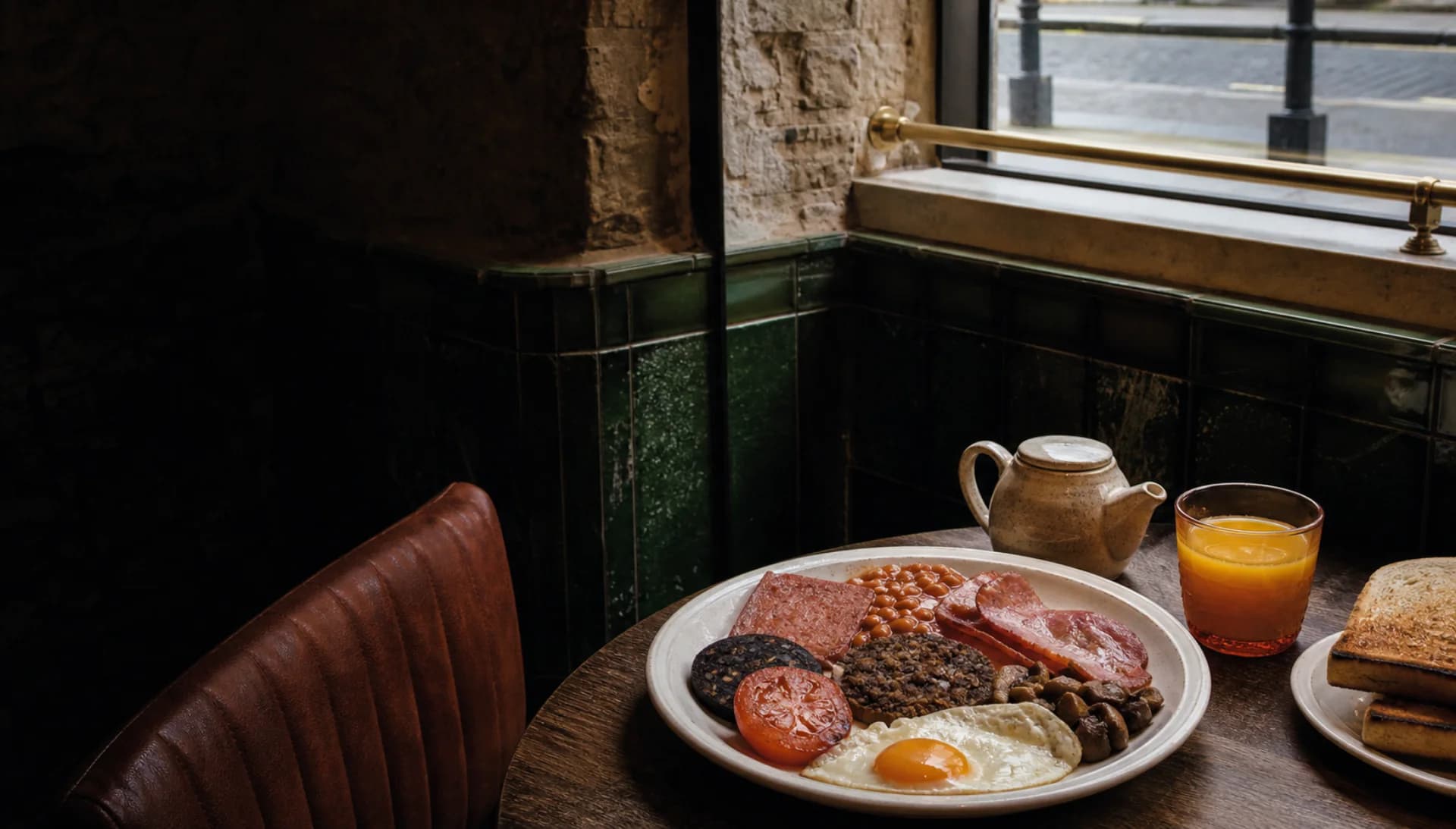 A full Scottish breakfast with tea and orange juice