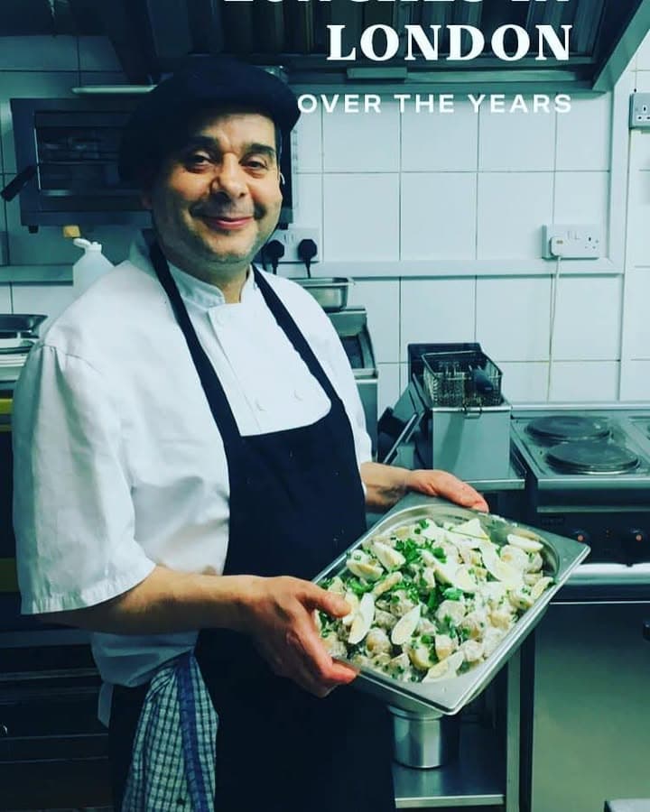 A member of the Café de Provence team preparing fresh food