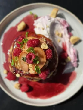 Berry pancake stack from Cafe Strange Brew's Instagram